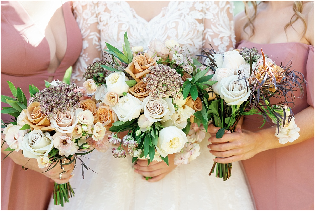 bride-and-bridesmaids-holding-bouquets 