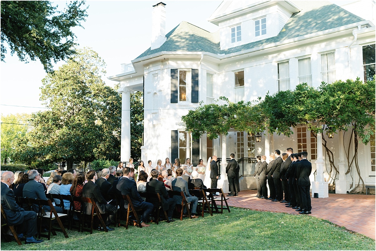 wedding ceremony on the grounds at Woodbine Mansion