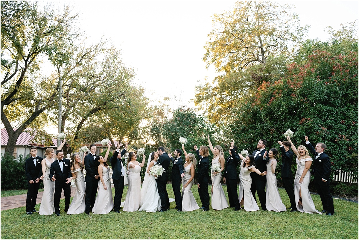 bridal party photo on the front lawn at Woodbine Mansion
