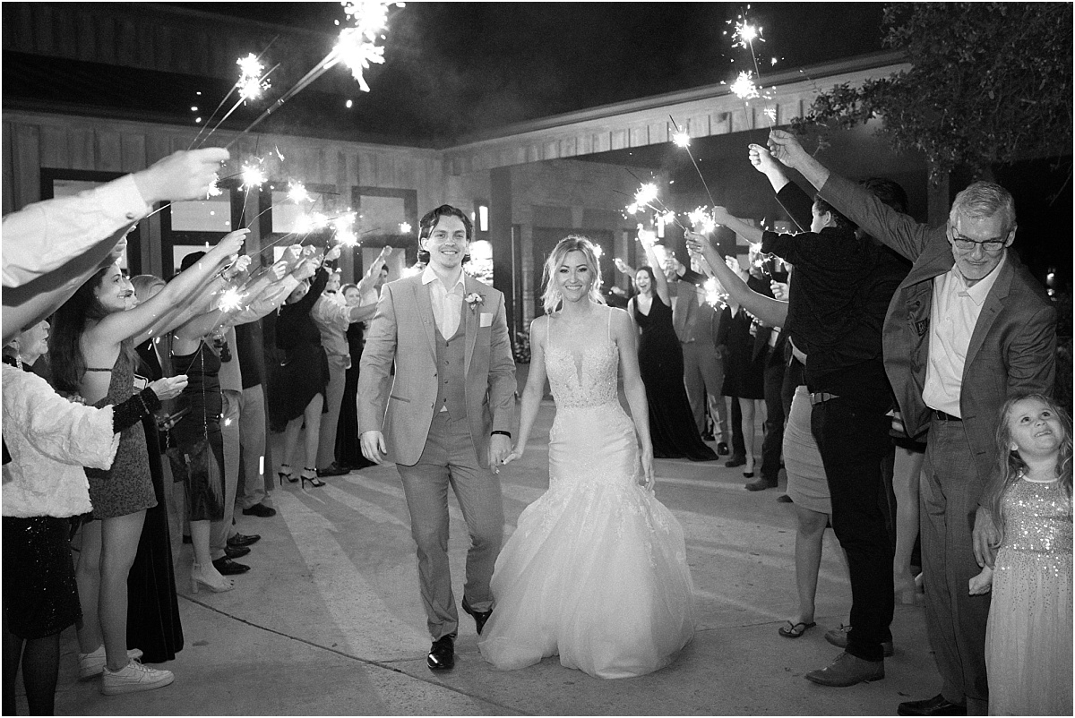bride-and-groom-walking-through-sparkler-exit