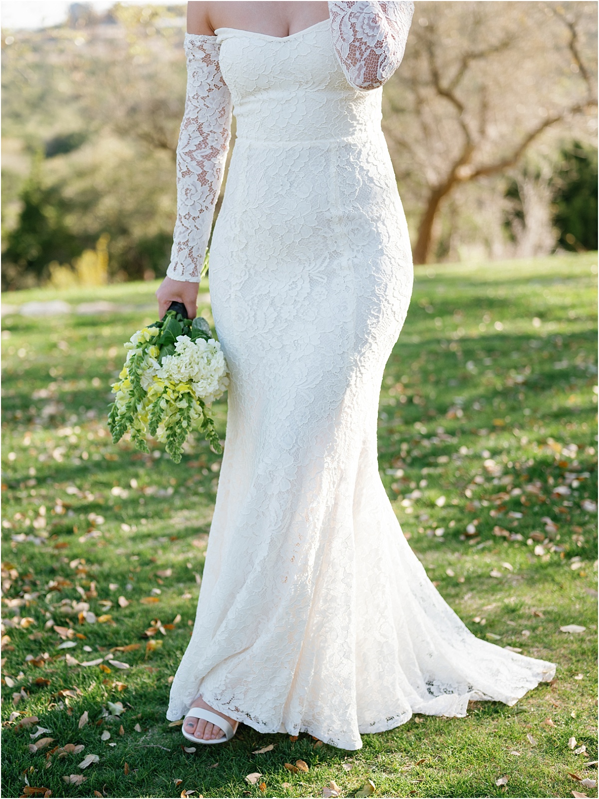 Bride in her wedding dress at Canyonwood Ridge in Dripping Springs, Texas