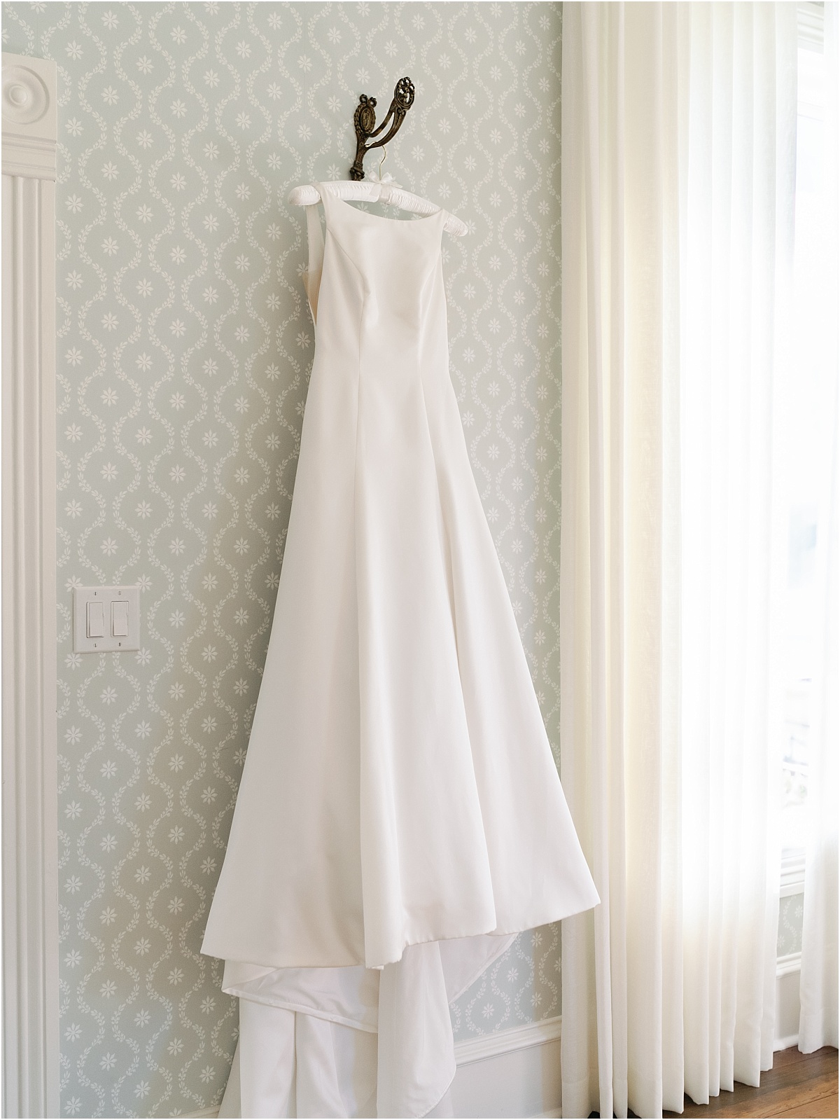 dress hanging in the bridal suite at woodbine mansion