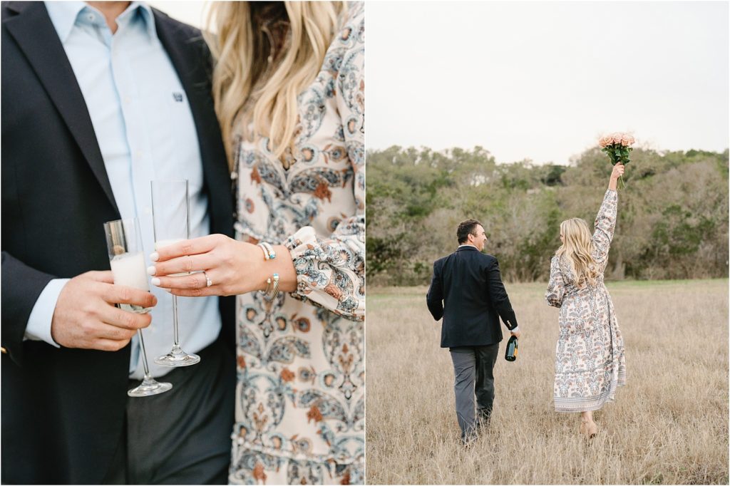 Couple drinking champagne in an open field.