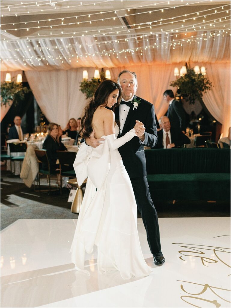 Bride dancing with her father at their Horseshoe Bay Yacht Club wedding reception.