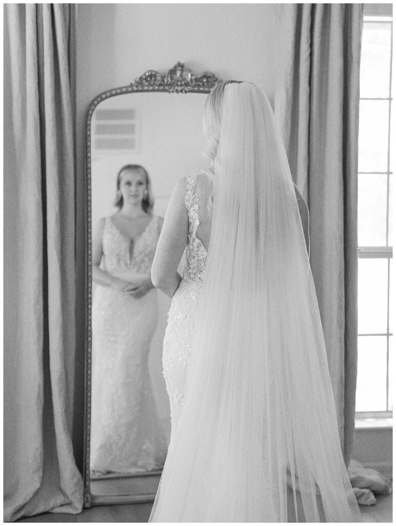 Bride getting dressed in the bridal suite at The Addison Grove.