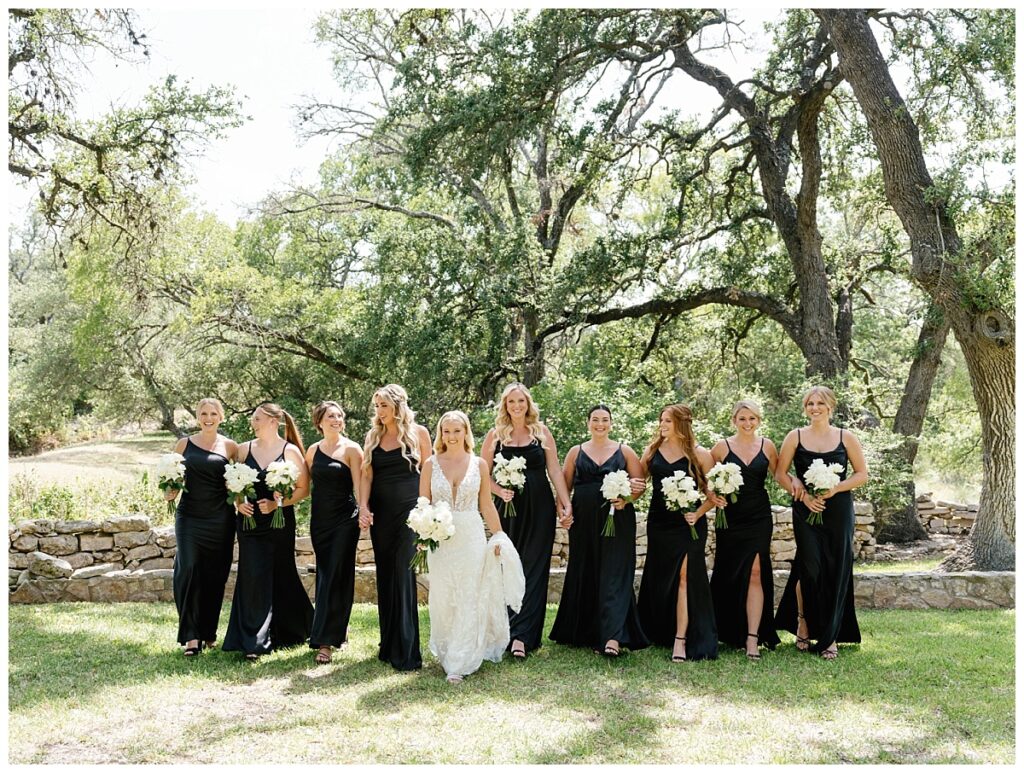 Bride and her bridesmaids outside at the Addison Grove.