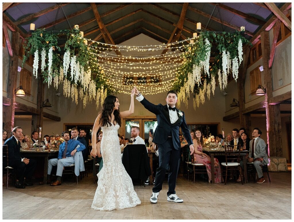 Savana and Casey share their first dance as husband and wife in the beautifully decorated reception space, surrounded by friends and family.