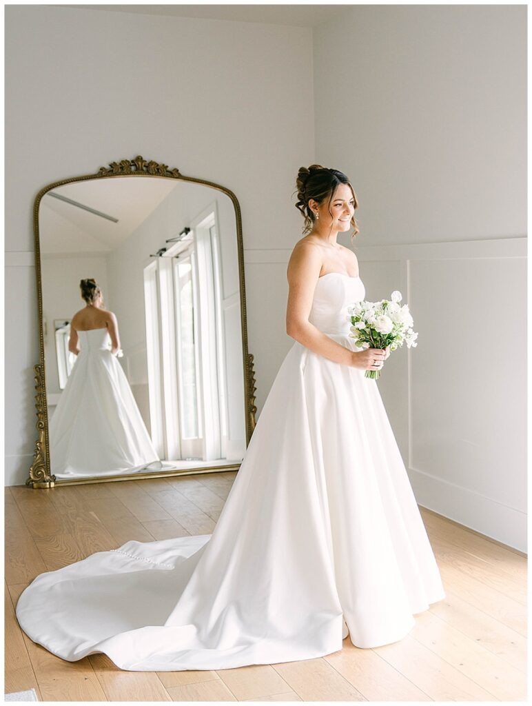 Bride getting ready in the beautifully lit bridal suite at The Preserve at Canyon Lake.