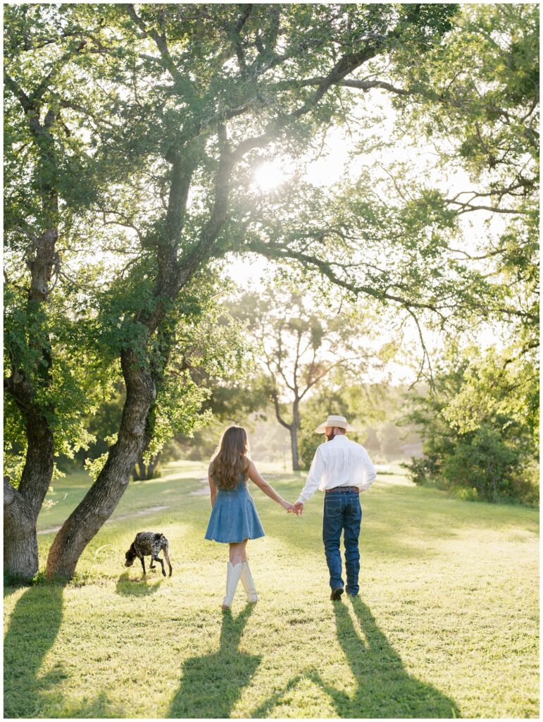Pet-friendly engagement photos of Caroline, Nathan, and their dog Hazel at Garey Park Georgetown Texas by Georgetown engagement photographer