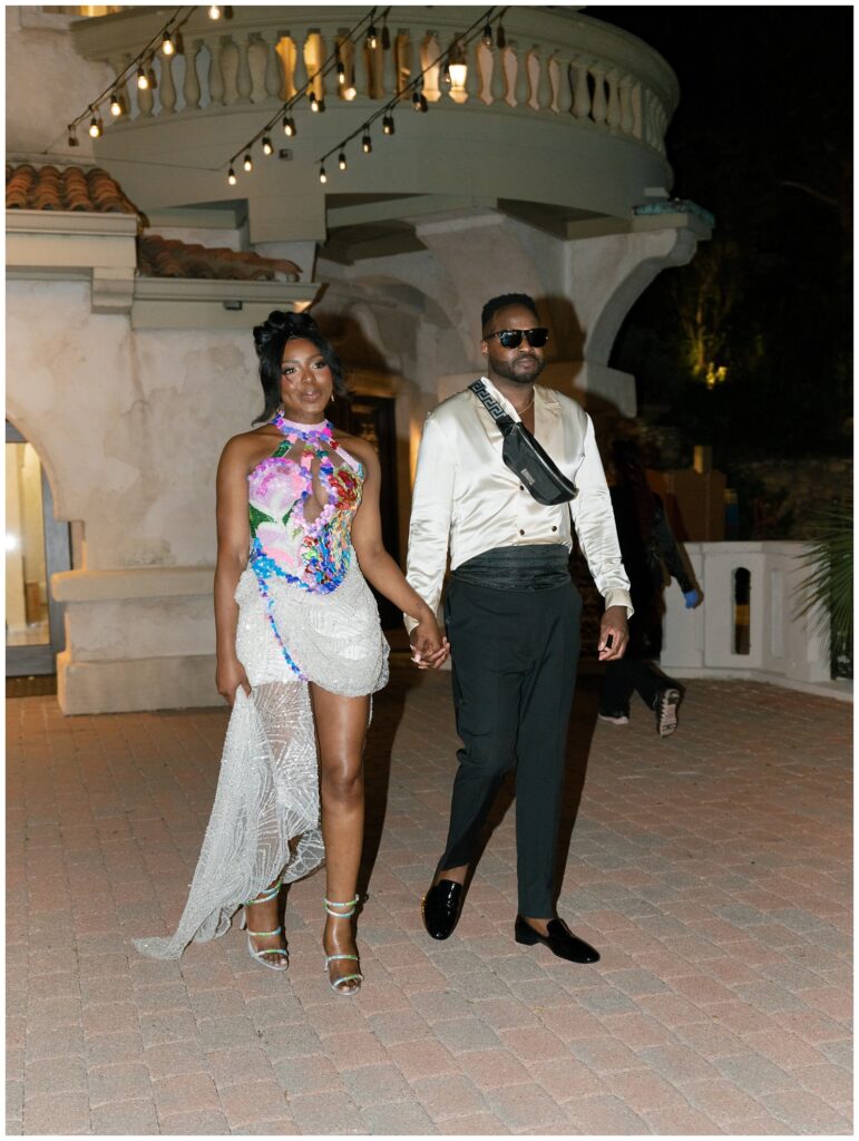 Bride wearing a custom second sequined dress for the reception.